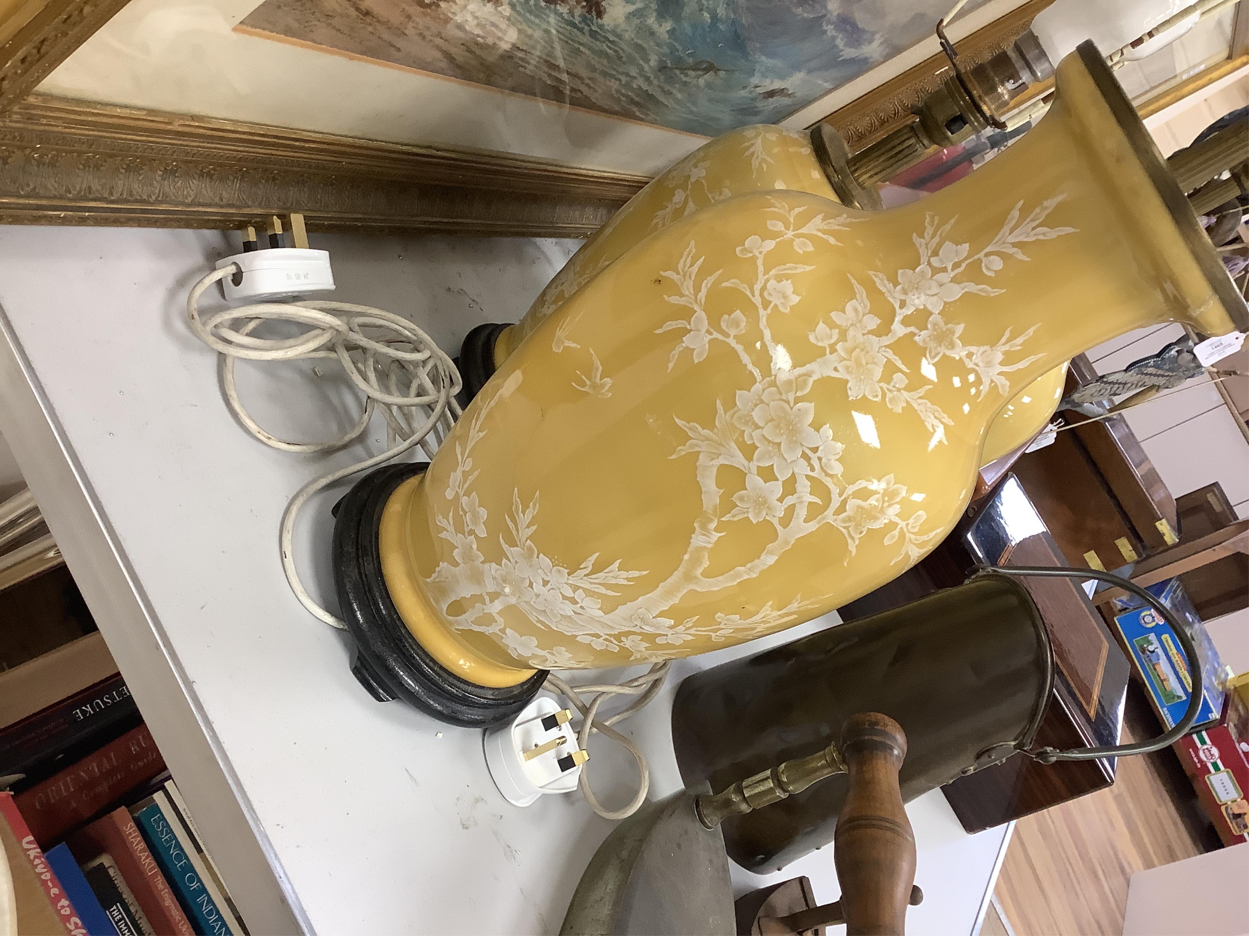 A garniture of three Chinese yellow ground lamp bases, pair 40cm high. Condition - fair